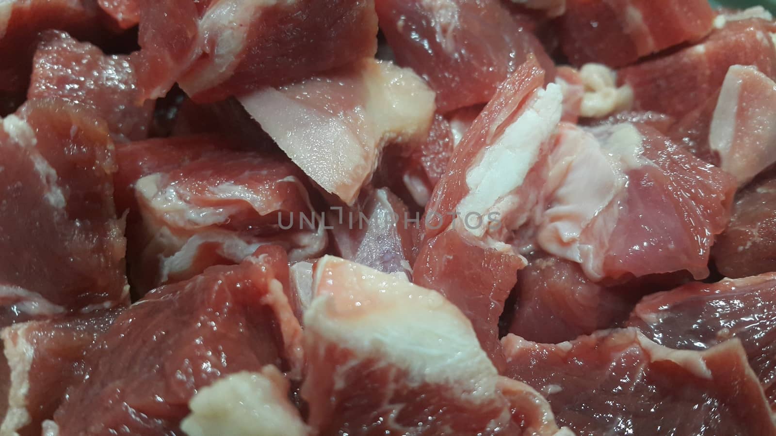 Red meat small steaks with whitish meat fat. by Photochowk