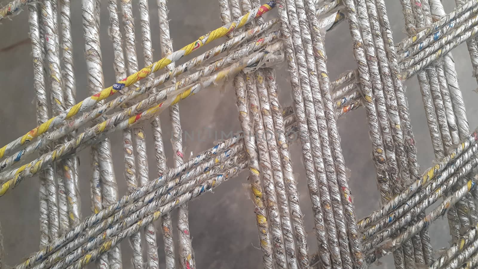 Closeup view of dried jute thread or ropes interwoven for making traditional old style bed called charpai