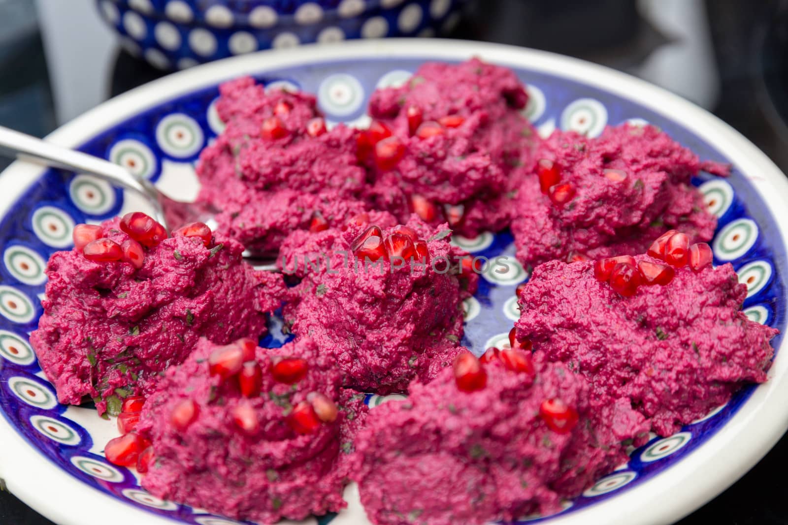 Pkhali, a Georgian vegetable dish with beetroot, walnuts and pomegranate seeds