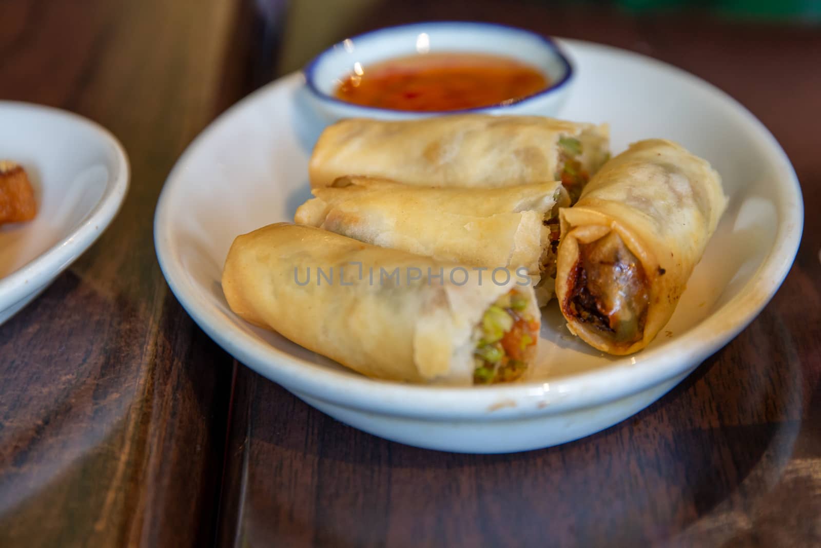 Hot vegetable spring rolls with sweet chilli sauce