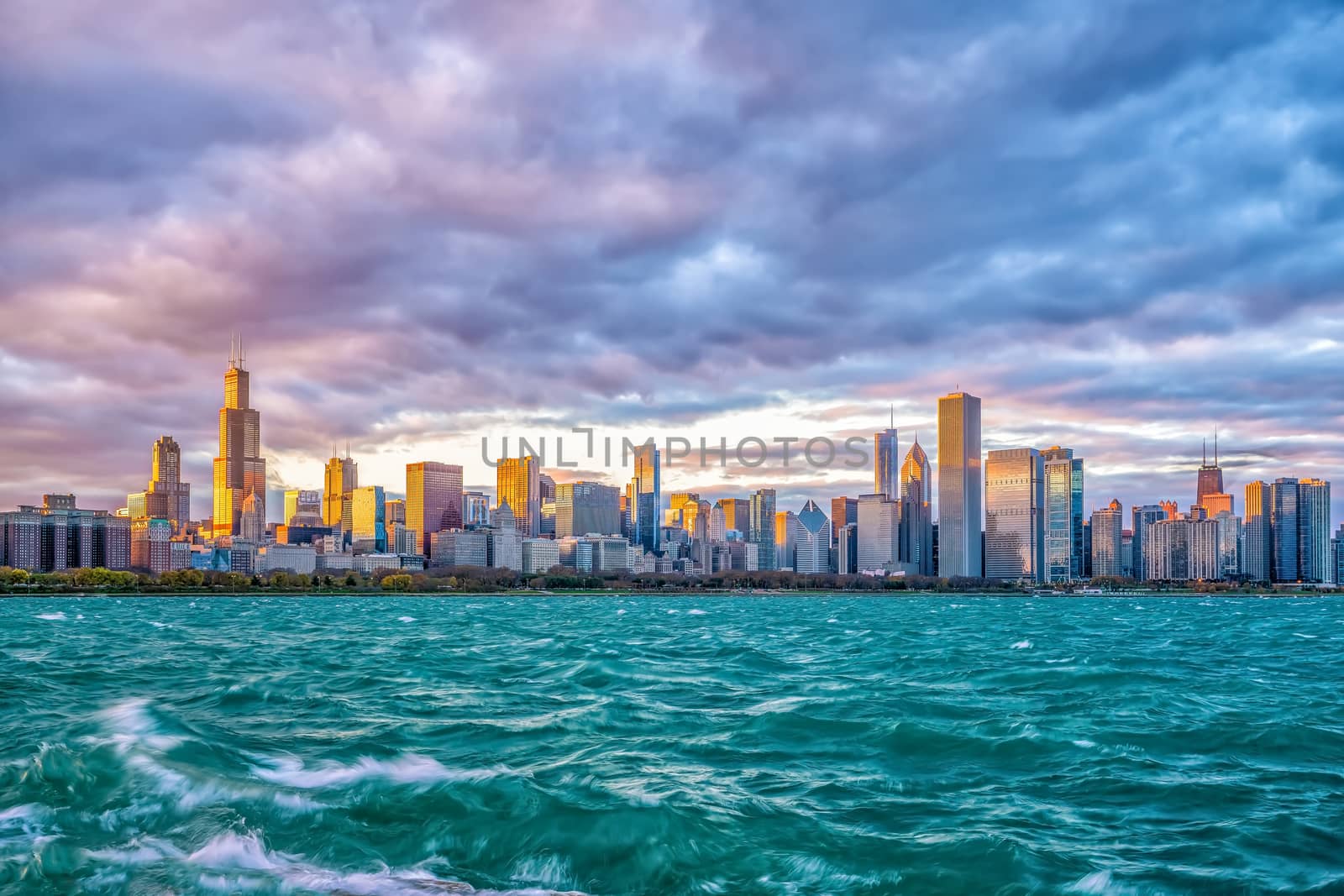 Downtown chicago skyline at sunset in Illinois by f11photo