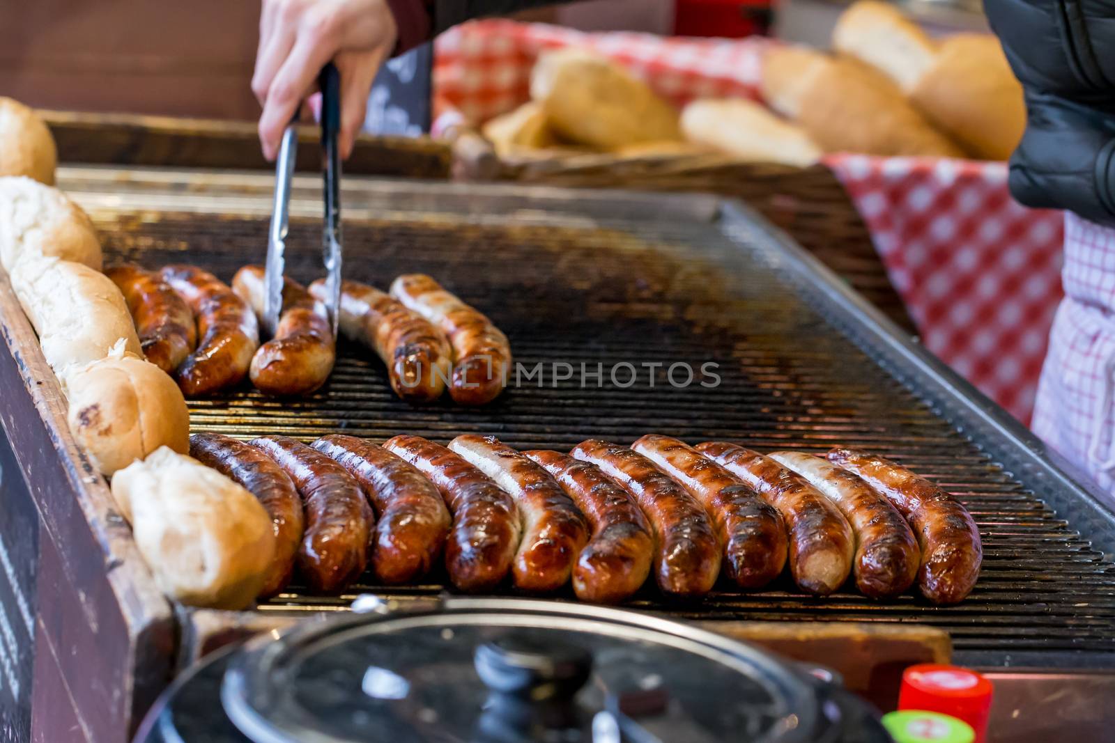 Sausages being cooked on a market stall