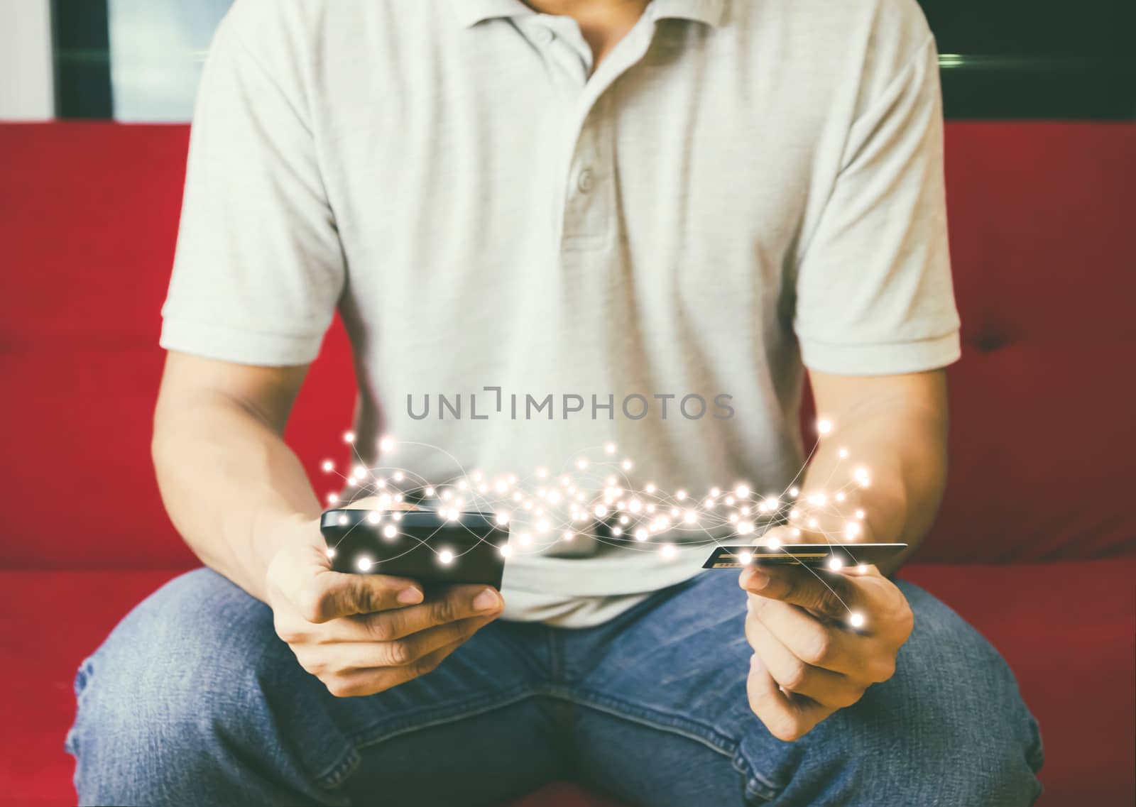 Man hands holding shopping and credit card manage online payment Network technology by using smart phone vintage image by sompongtom