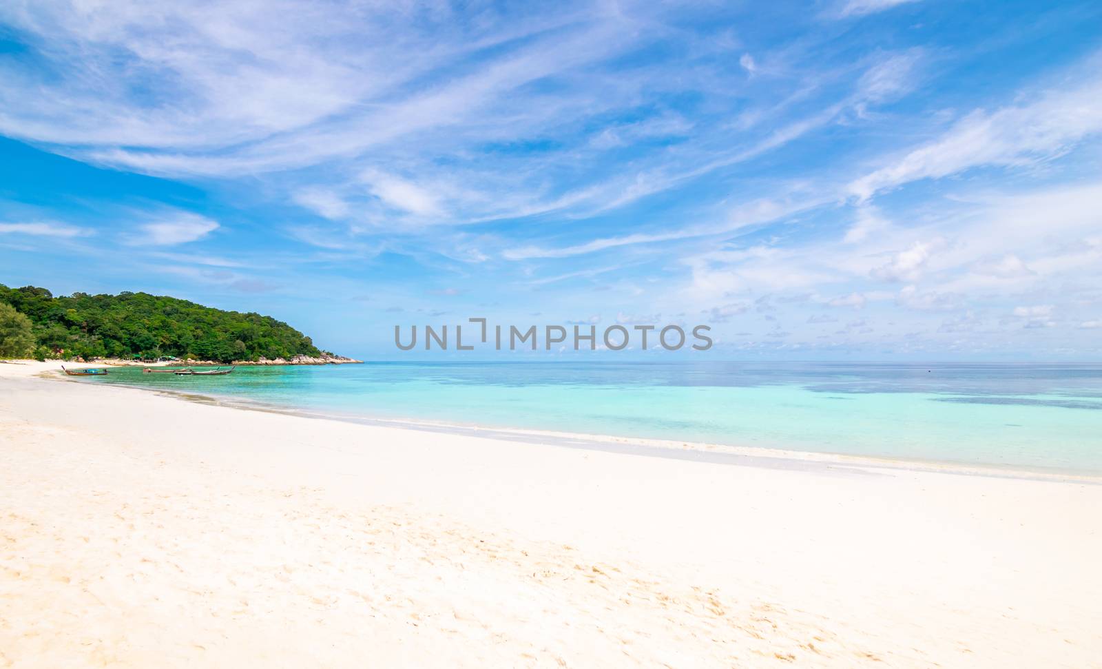 Sea and clear water beach have a holiday summer relaxing and travel bright sky koh lipe thailand by sompongtom