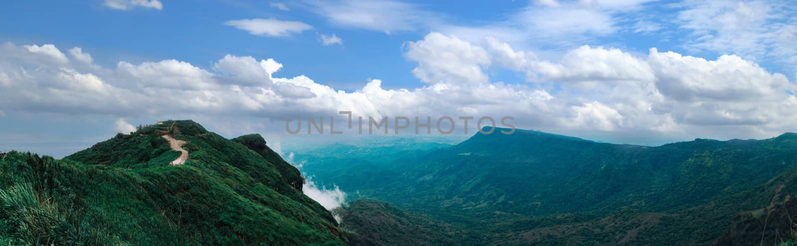 Panorama views valley mountain and sky rainy season by sompongtom