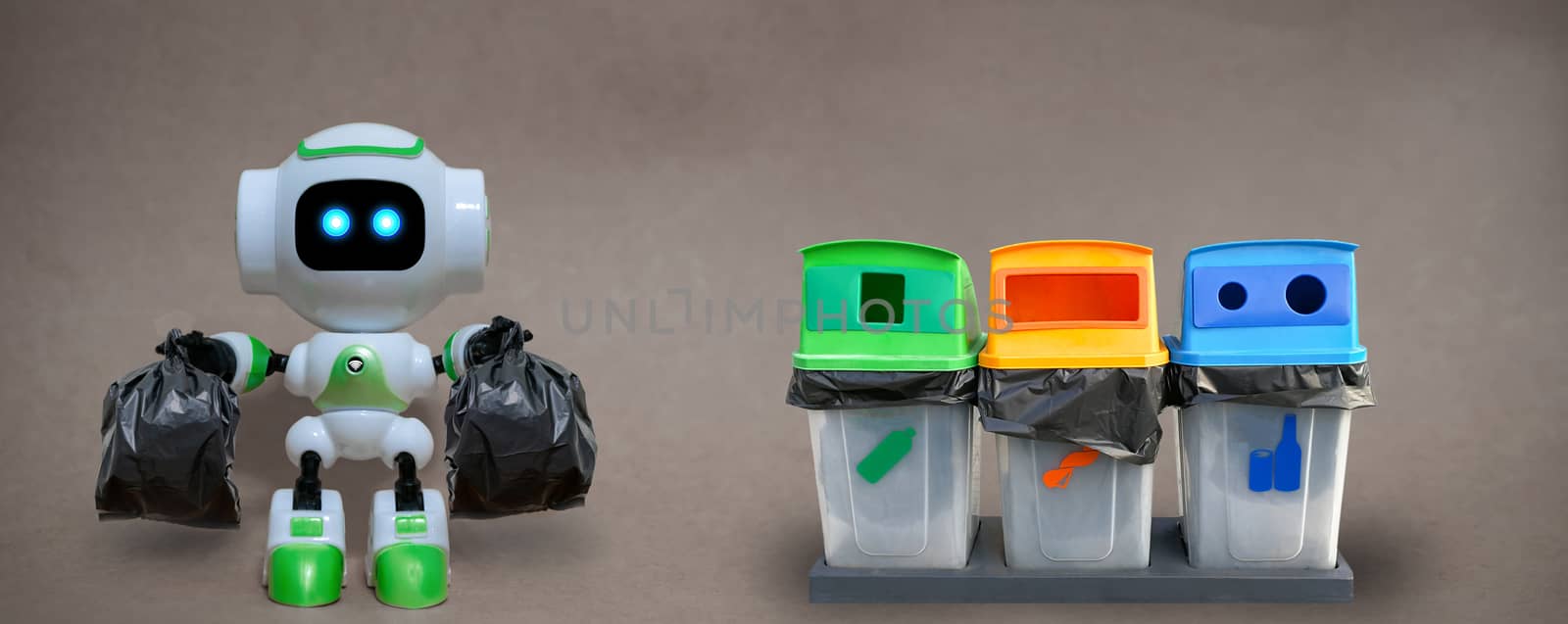 Robot hold garbage bags technology recycle environment on a gray background by sompongtom