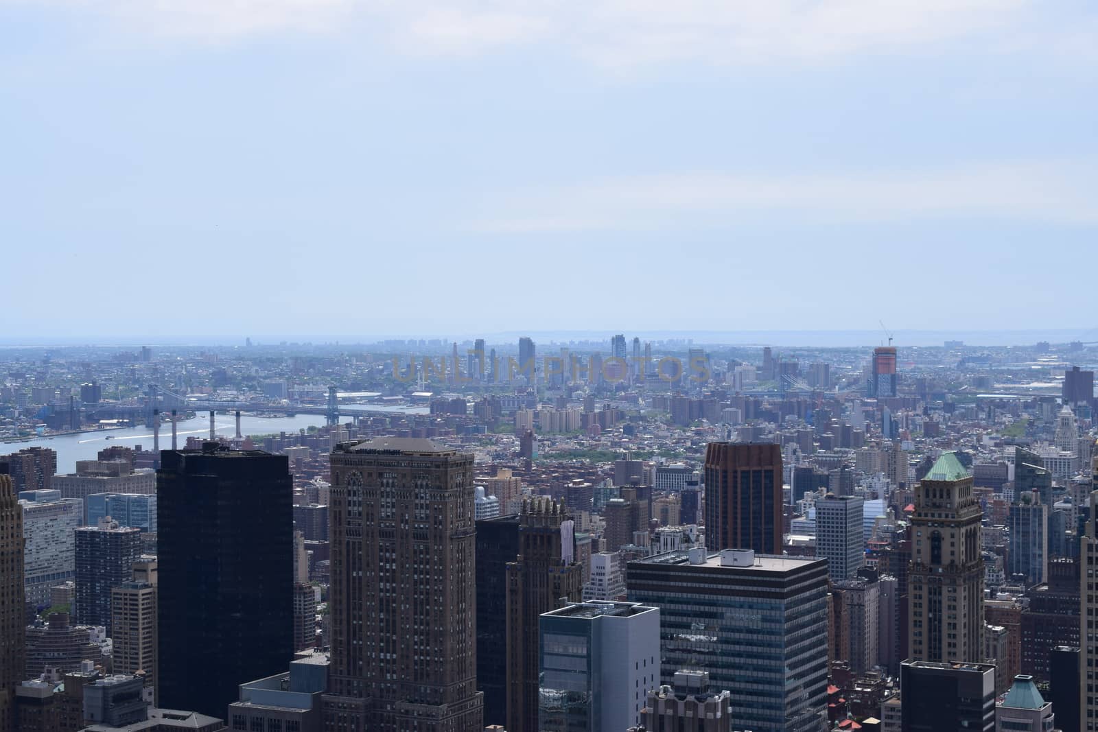 New York Manhattan skyline from Top of the Rock observation deck, panoramic view in a sunny day on NY City, USA by matteobartolini