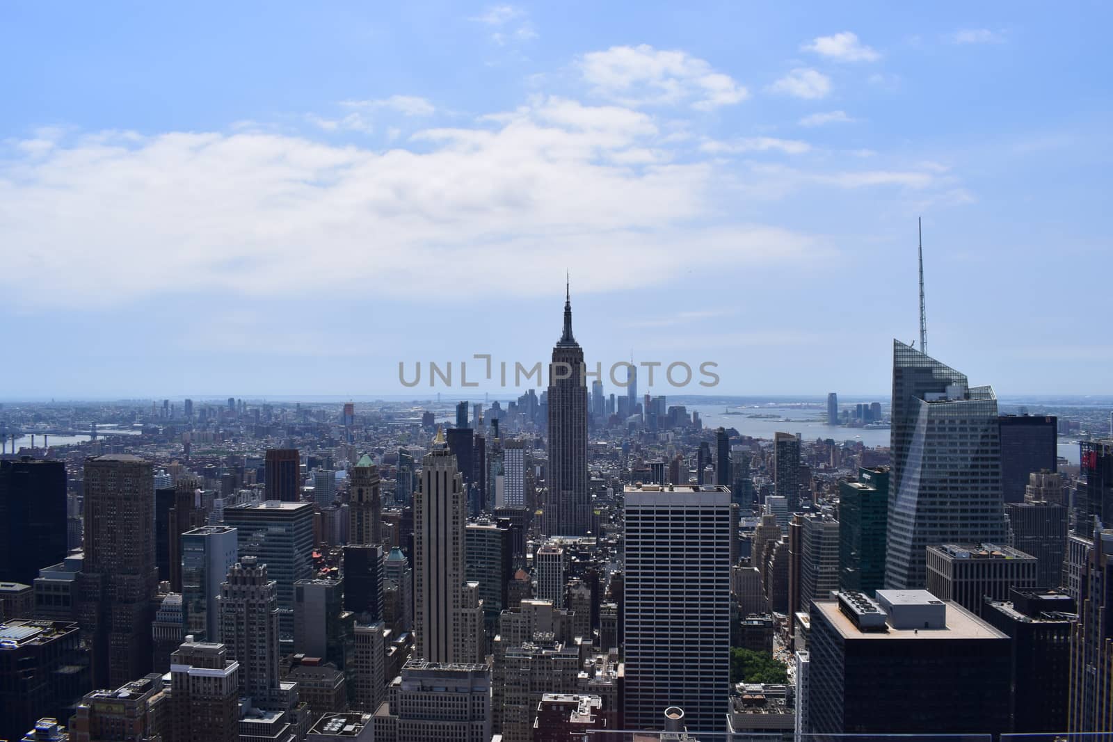 New York Manhattan skyline from Top of the Rock observation deck, panoramic view in a sunny day on NY City, USA by matteobartolini