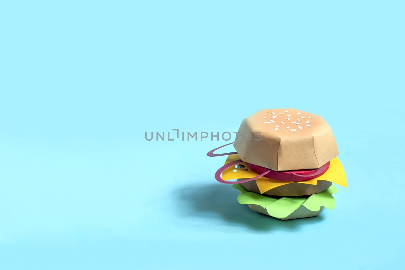 Hamburger made of paper. Real volumetric handmade paper objects. Paper art and craft