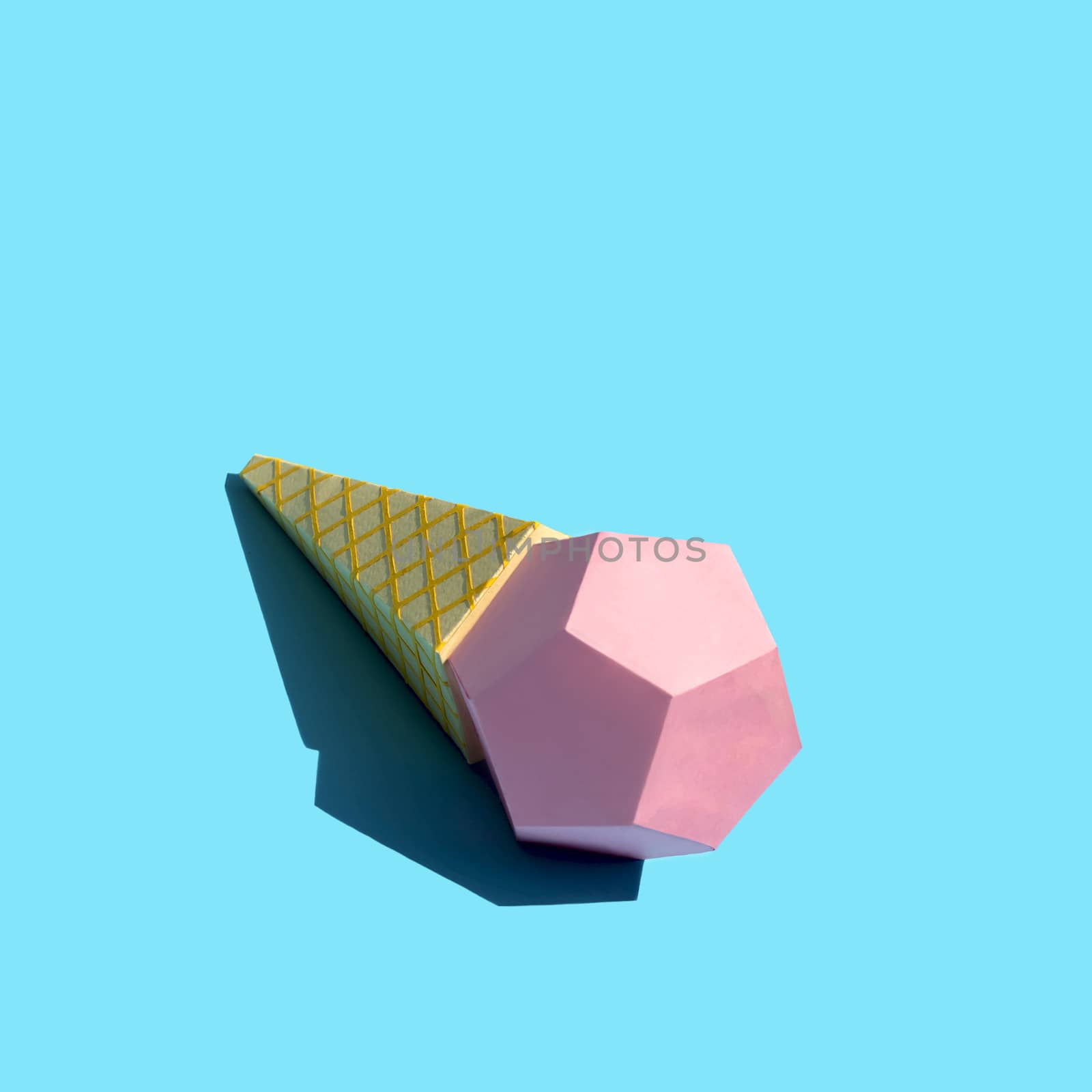 Paper ice cream in waffle cone with shade in bright sunshine. Real volumetric handmade paper objects. Paper art and craft