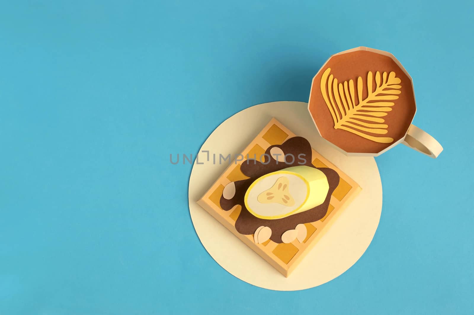 Belgian waffles with chocolate syrup, almonds and banana, cup of cappuccino made of paper. Real volumetric handmade paper objects. Paper art and craft