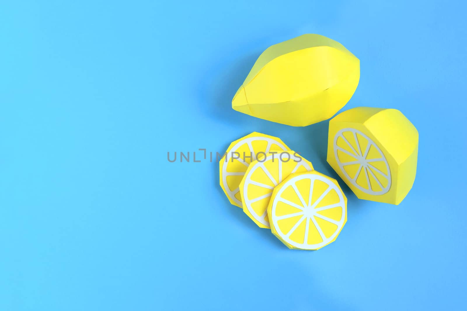 Paper lemon (whole fruit, half and slices). Real volumetric handmade paper objects. Paper art and craft