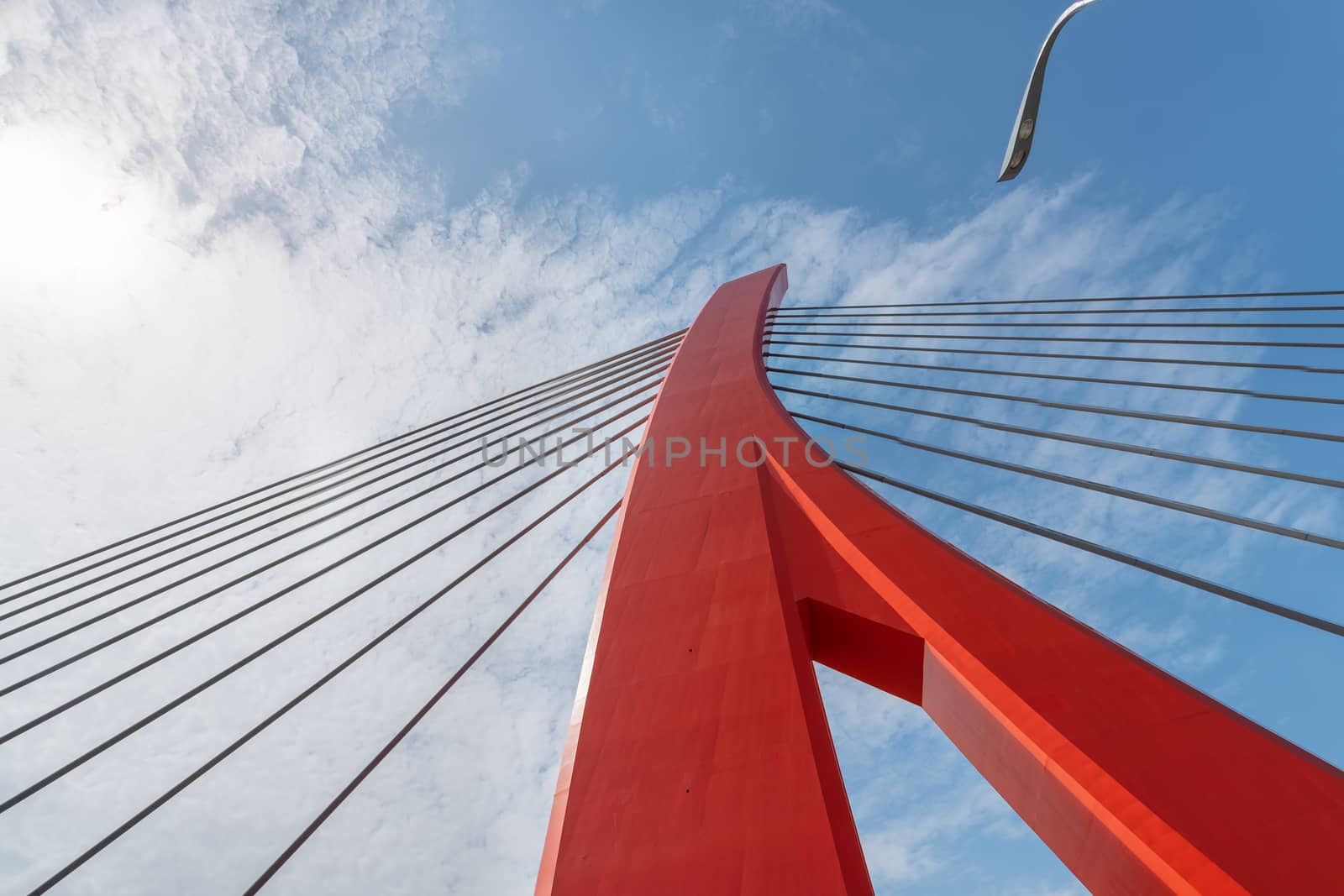 Red cable bridge against blue sky, Chengdu, China