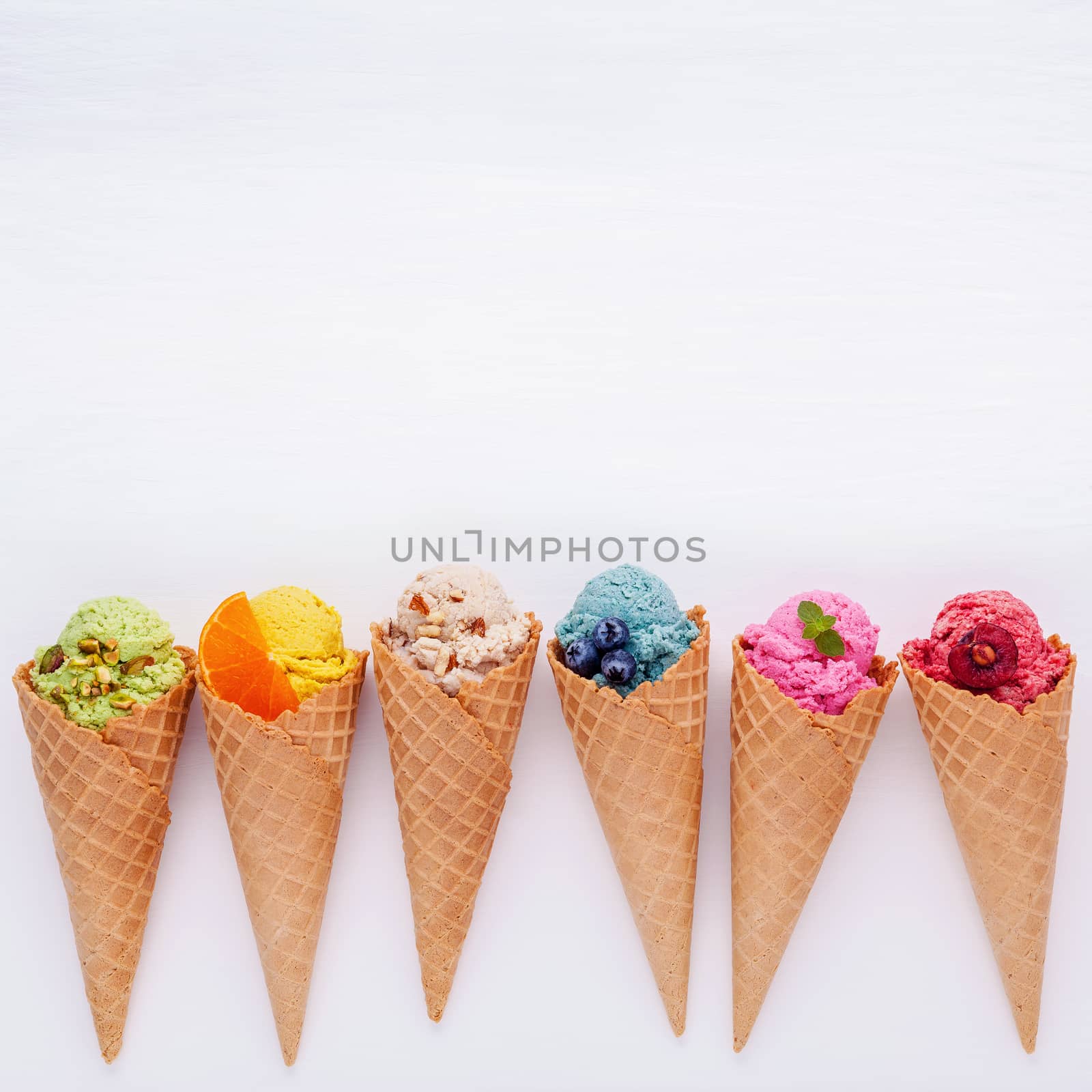 Various of ice cream flavor in cones blueberry ,strawberry ,pist by kerdkanno
