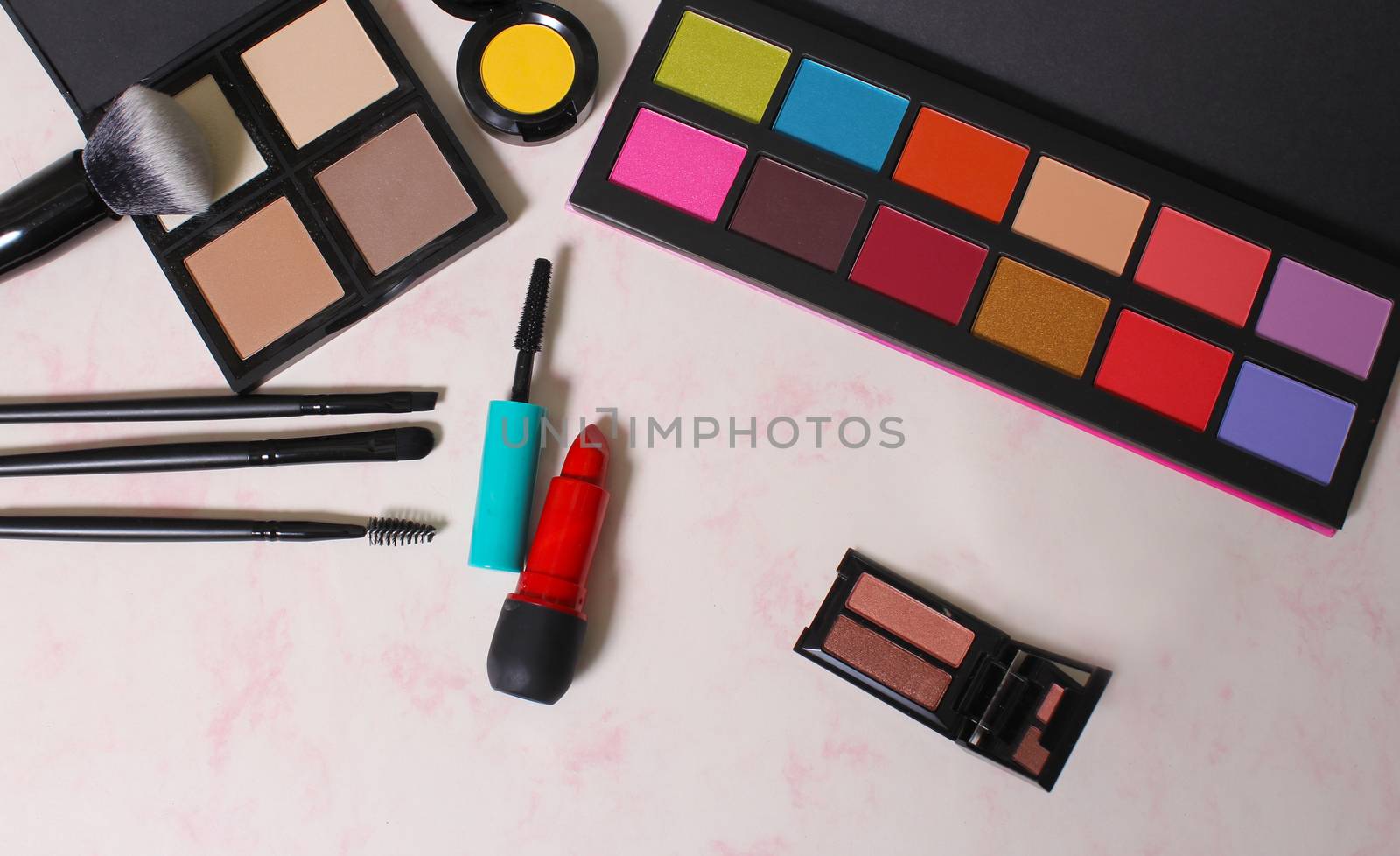 Colorful Cosmetics on paper background by Marti157900