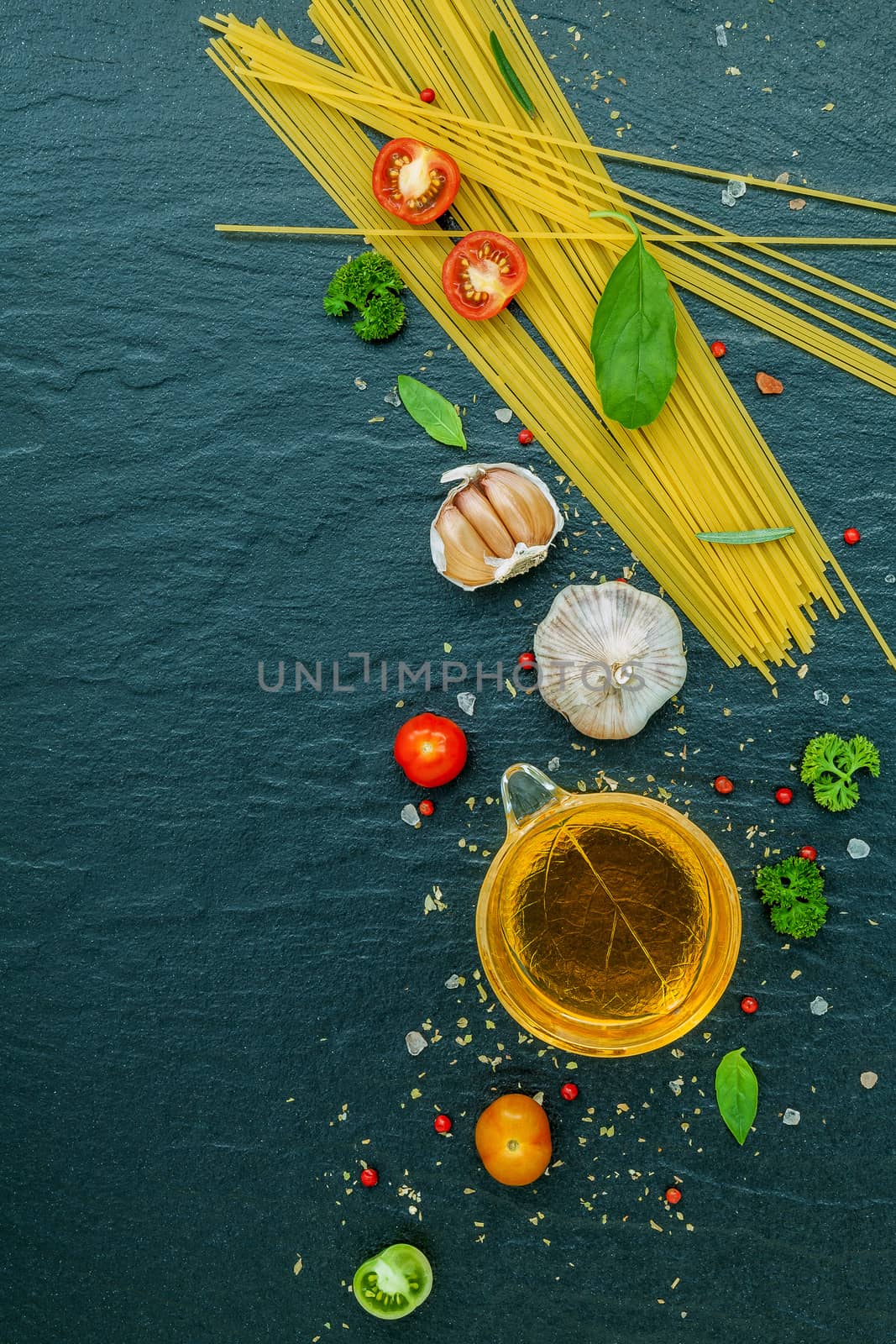 Italian food concept. Spaghetti with ingredients sweet basil ,to by kerdkanno