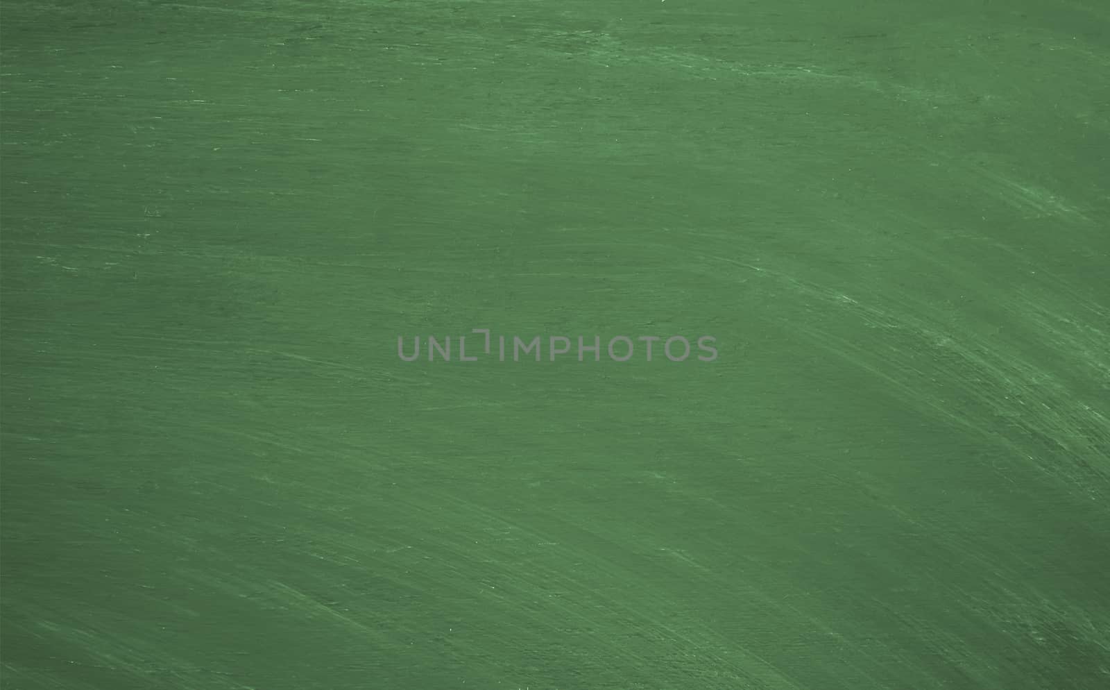 Chalk rubbed out on green blackboard for background.