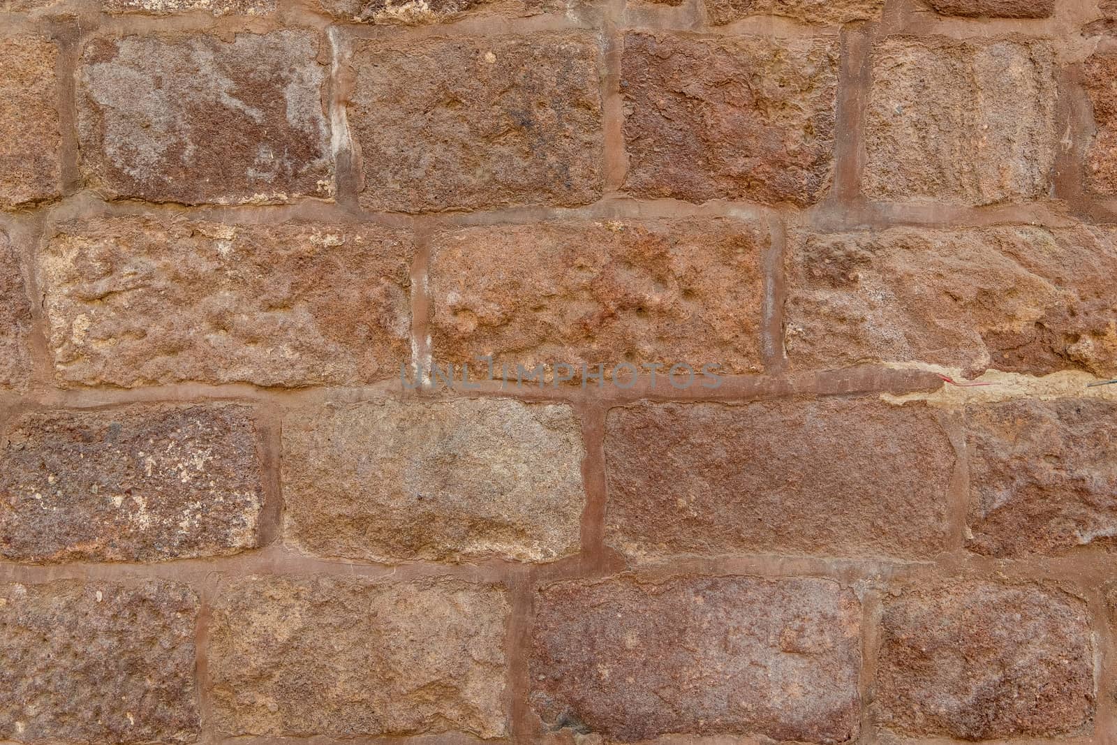 Stone wall texture background. Material construction and architectural detail.