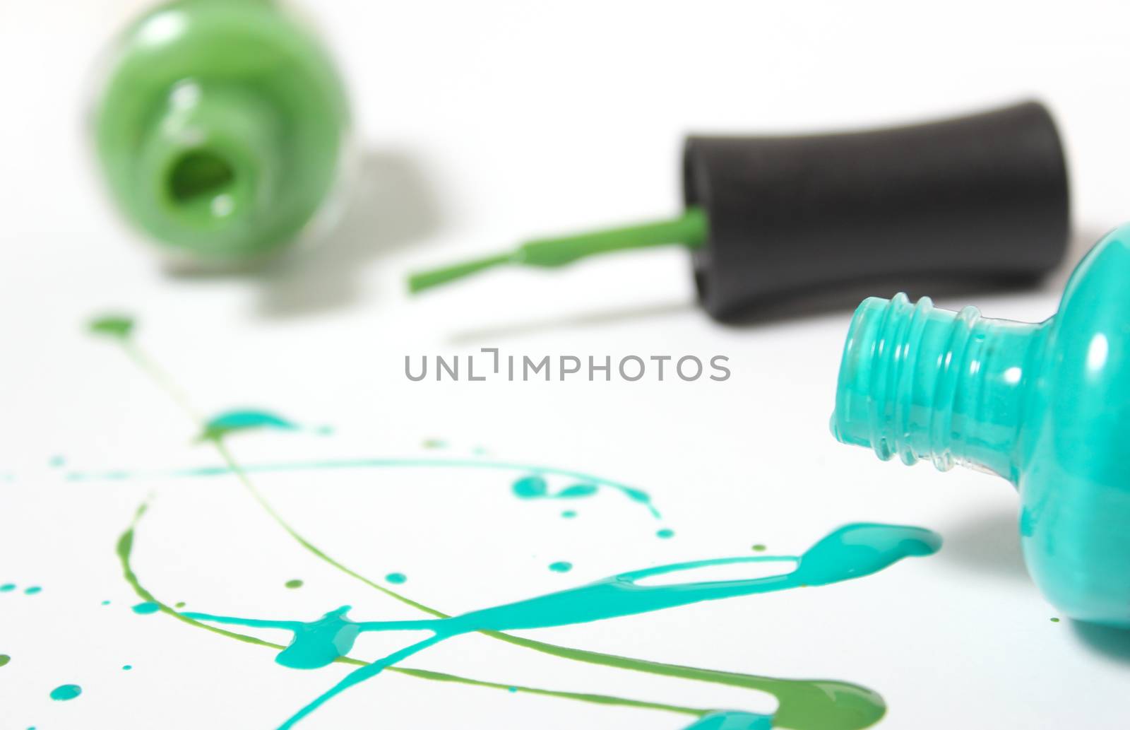 Blue and Green Spilled Nail Polish on White by Marti157900