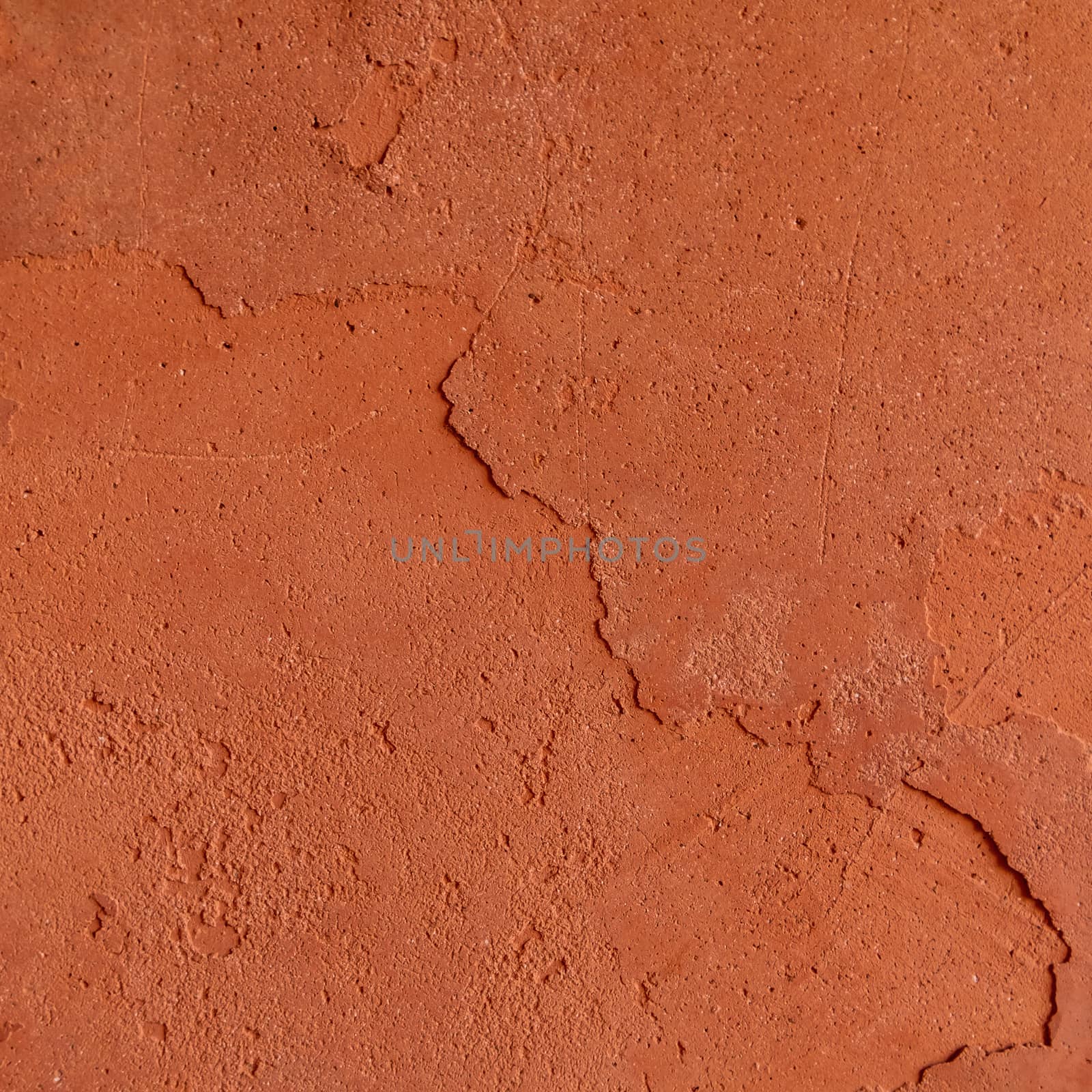 Red rough stone texture background. Material construction and architectural detail.