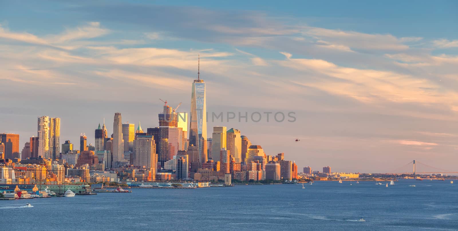 New York City downtown Manhattan sunset skyline panorama view over Hudson River in USA