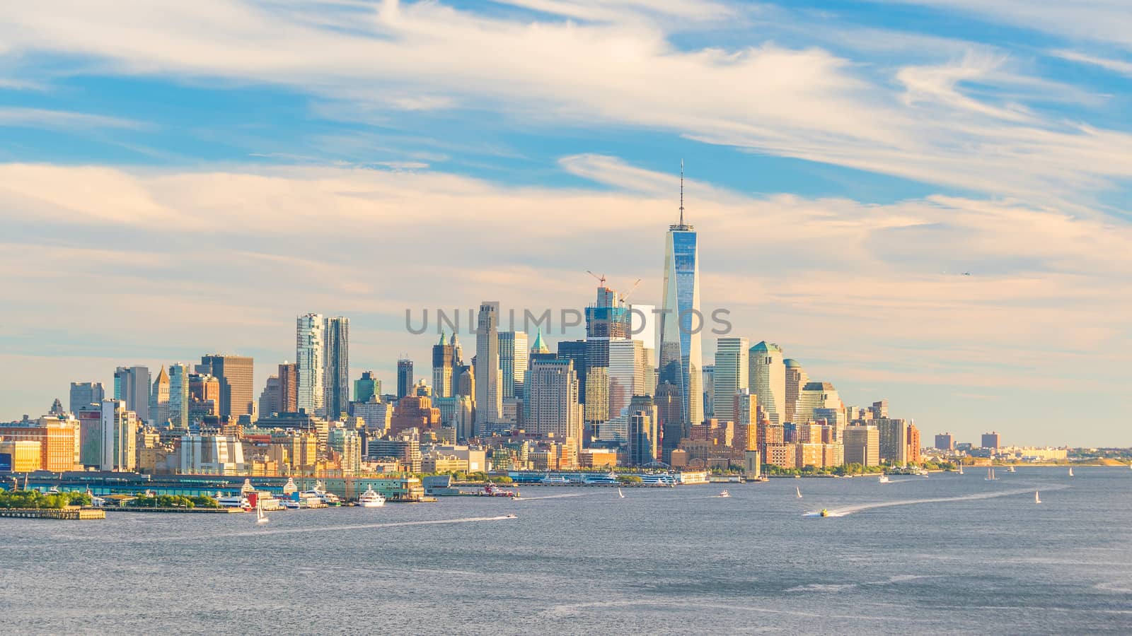 New York City downtown Manhattan sunset skyline panorama view over Hudson River in USA