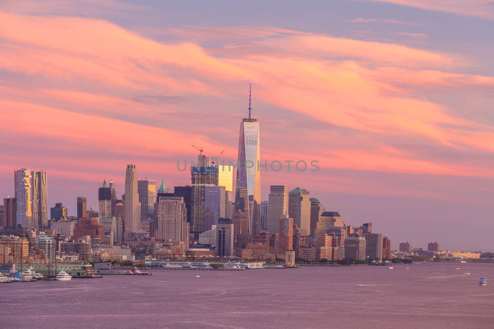 New York City downtown Manhattan sunset skyline panorama view over Hudson River in USA