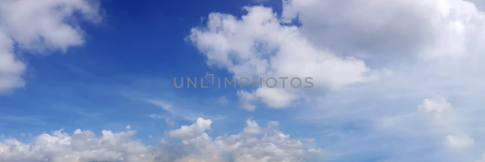 Vibrant color panoramic sky with cloud on a sunny day. by Tanarch