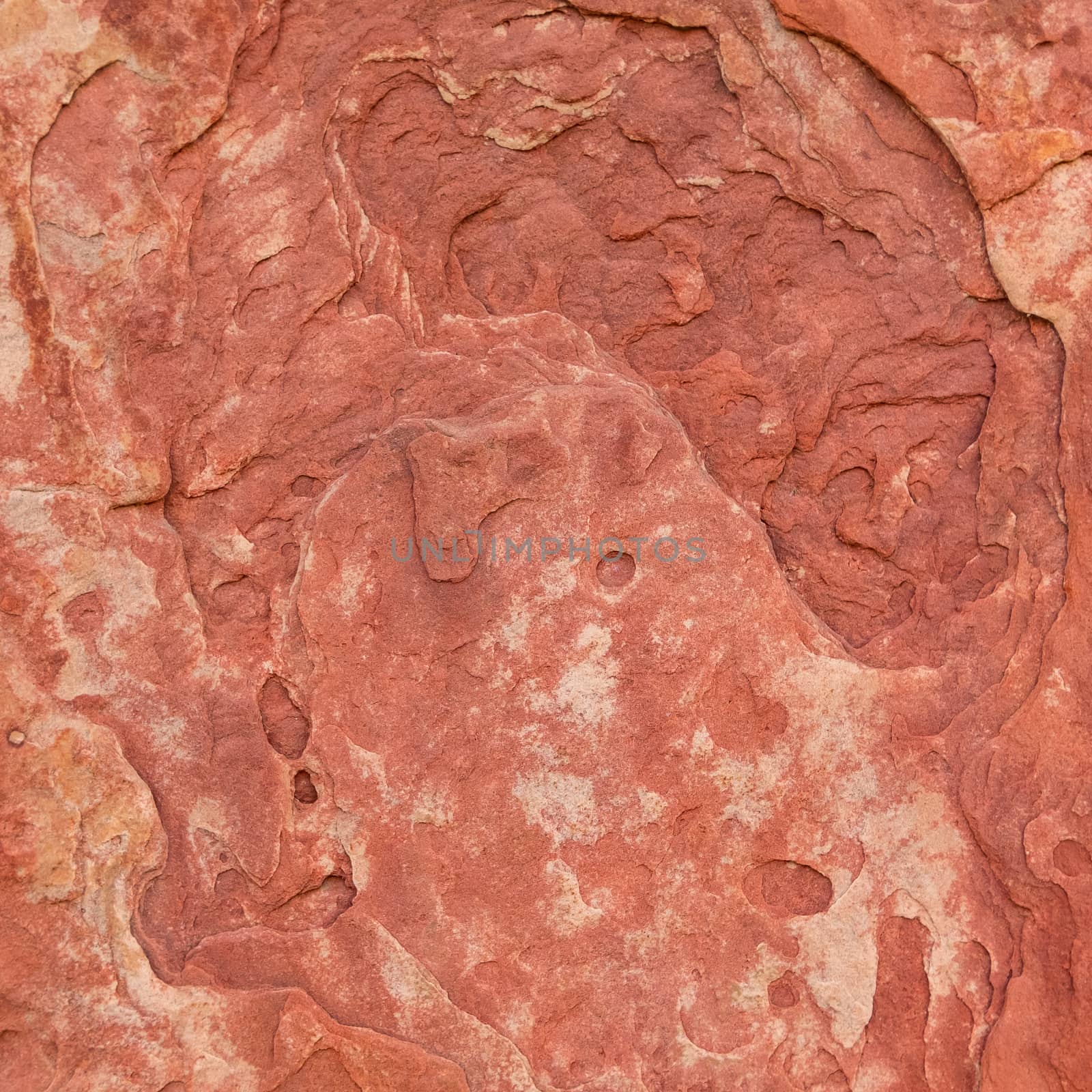 Red rough stone texture background. Material construction and architectural detail.