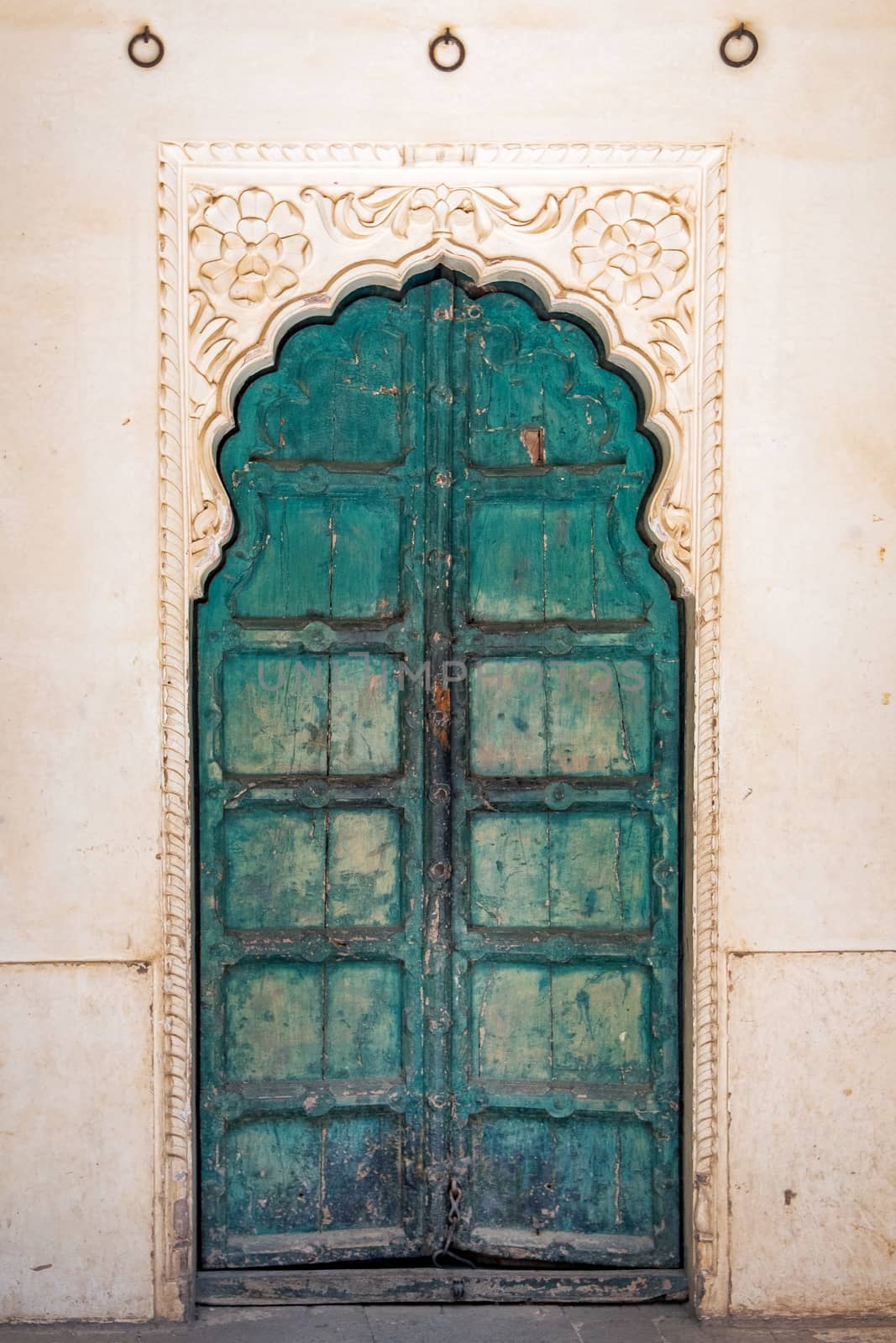 Antique rustic ancient wooden door. Architectural element.