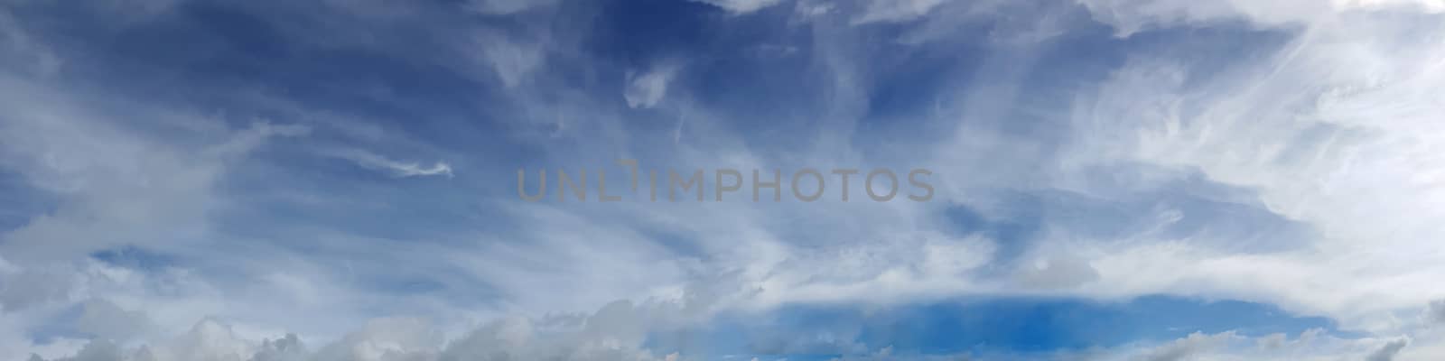 Vibrant color panoramic sky with cloud on a cloudy day. by Tanarch