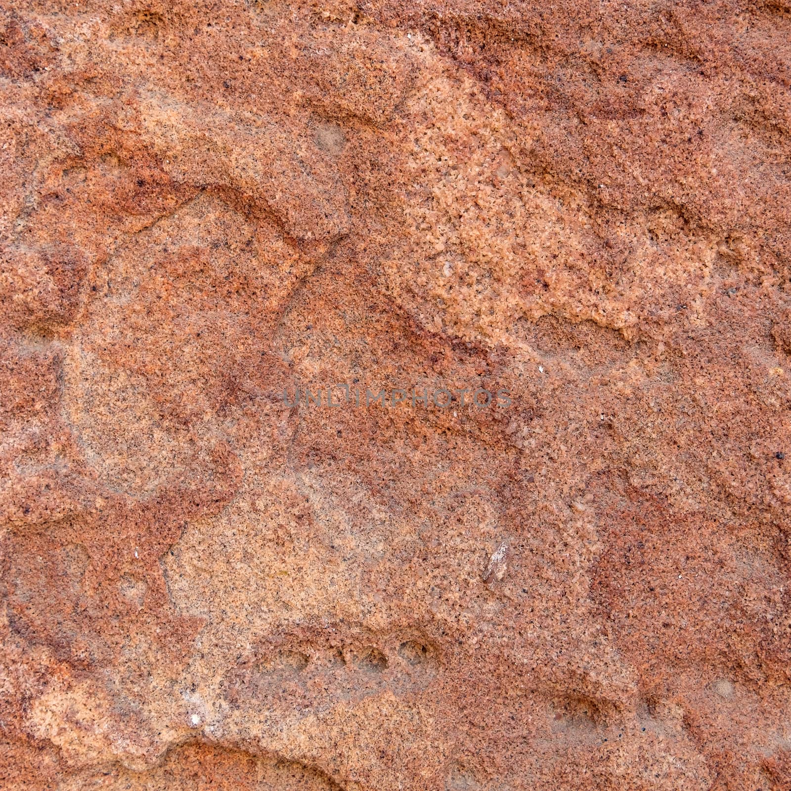Red rough stone texture background. by Tanarch