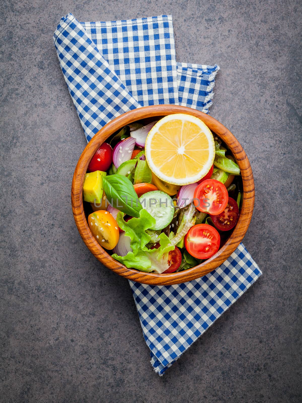 The bowl of healthy vegan salad . Various vegetables avocado, to by kerdkanno