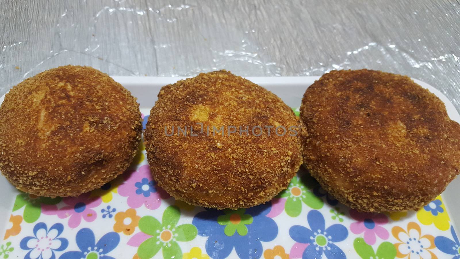 Closeup view of fried pizza bombs or pizza balls are altered form of pizza. by Photochowk