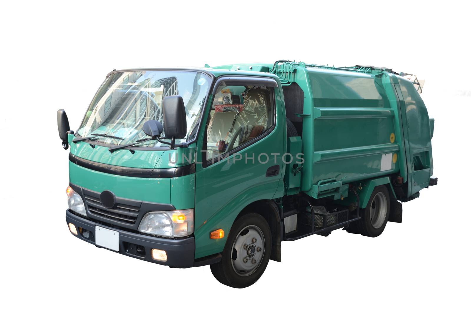 Small green garbage truck on white background.