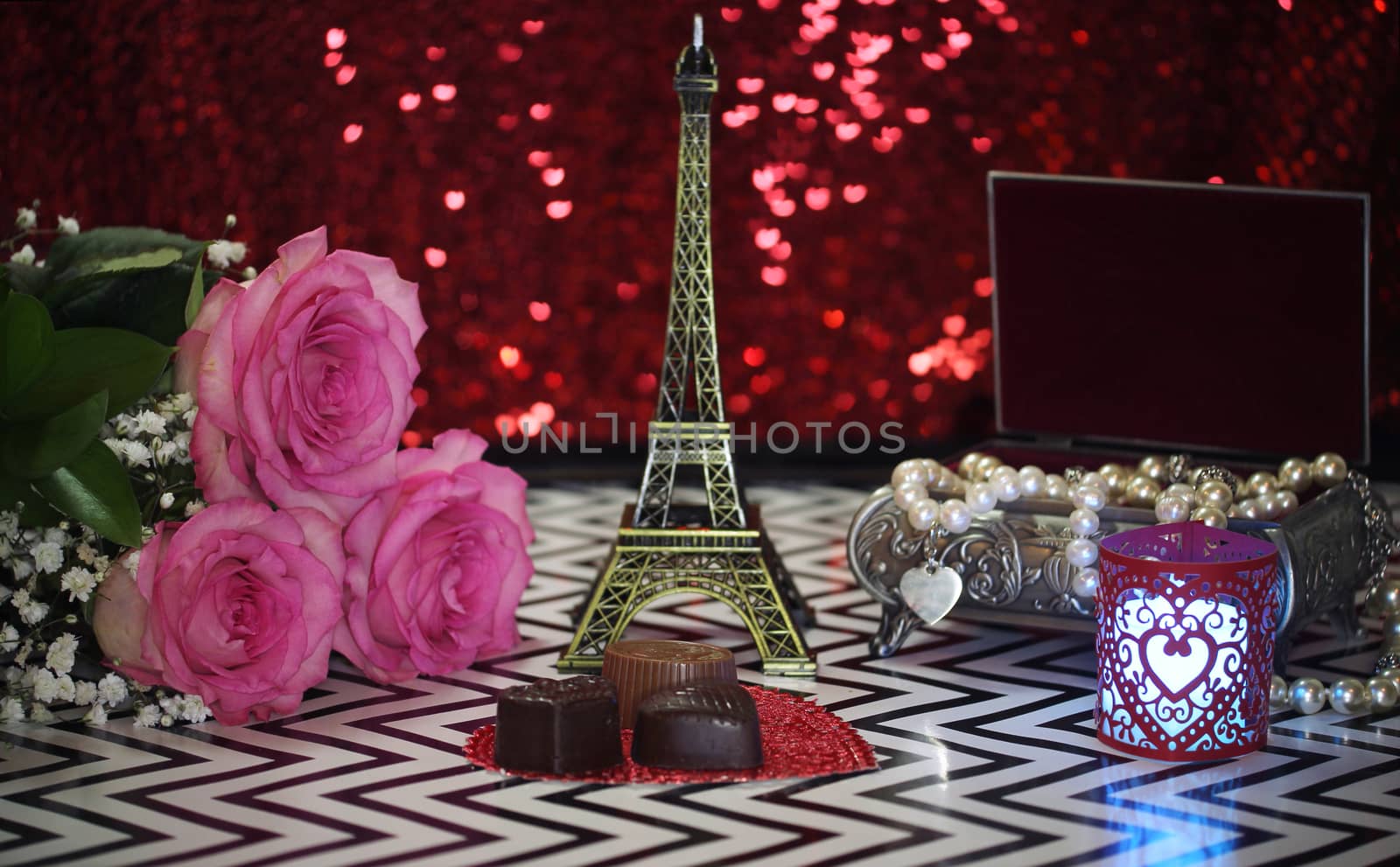 Pink Rose With Eiffel Tower Replica Shallow DOF, Focus on Chocolate Candy