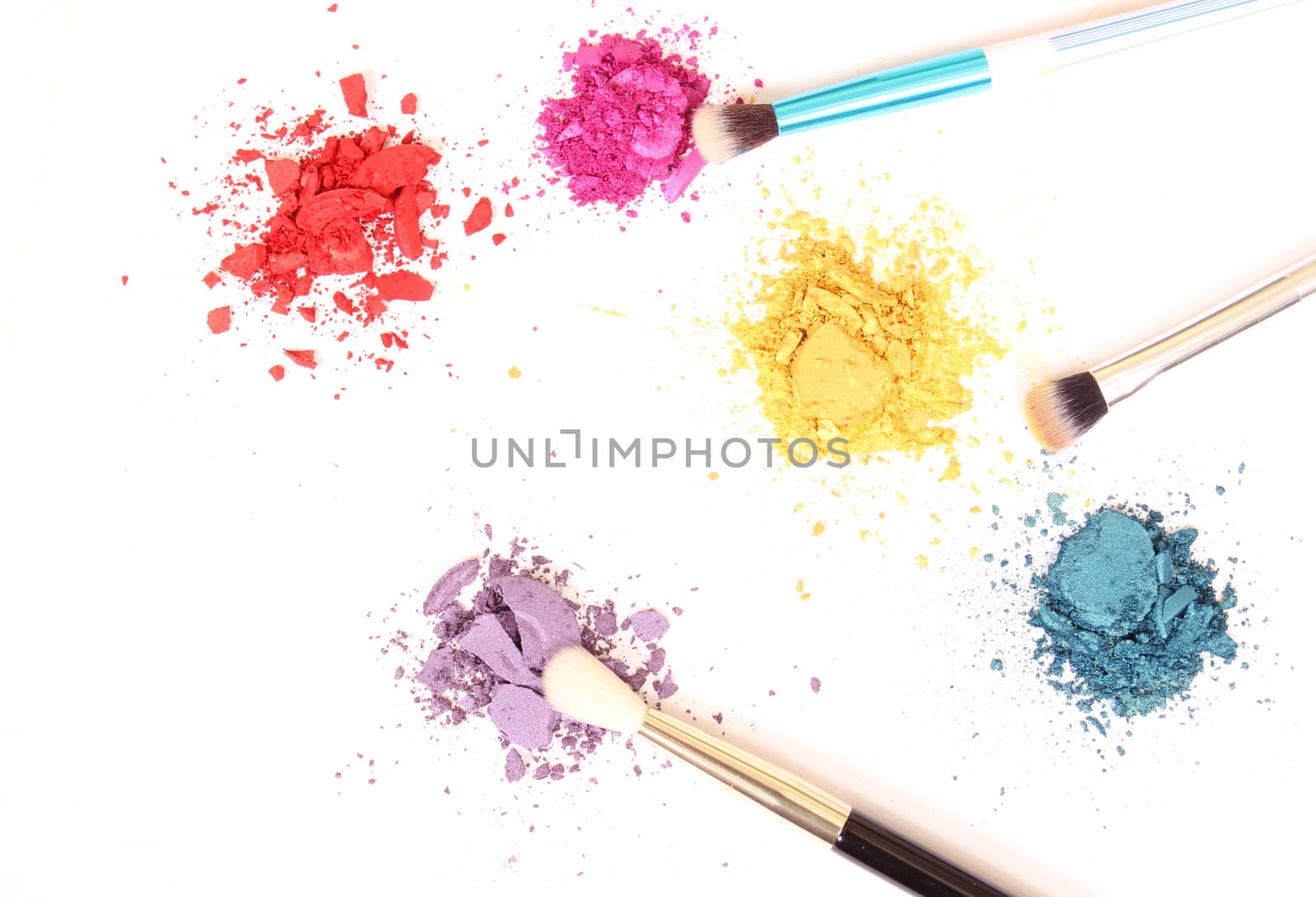 Broken Cosmetic Pigments With Brush on White Background