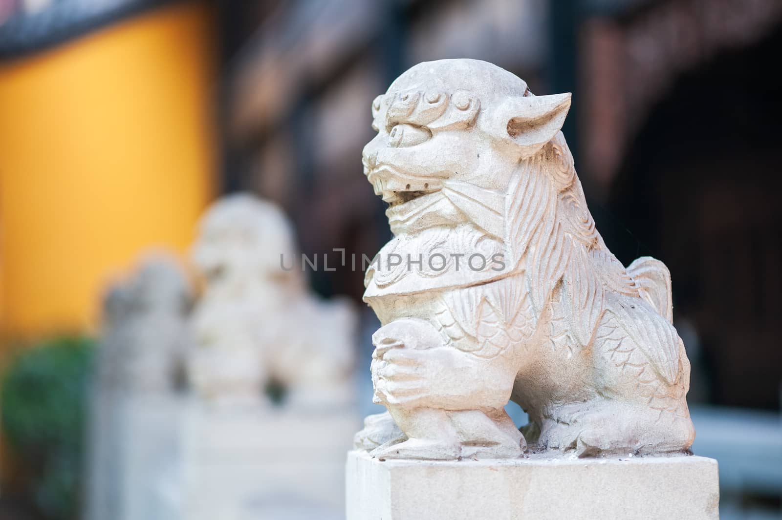 Lion white stone statue in a buddhist temple, Chongqing, China