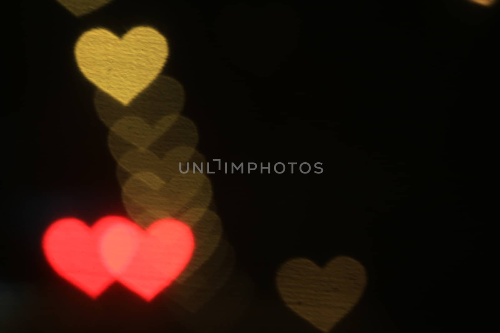 Valentines Colorful heart-shaped on black background lighting bokeh for decoration at night backdrop wallpaper blurred valentine, Love Pictures background, Lighting heart shaped soft at night abstract by cgdeaw