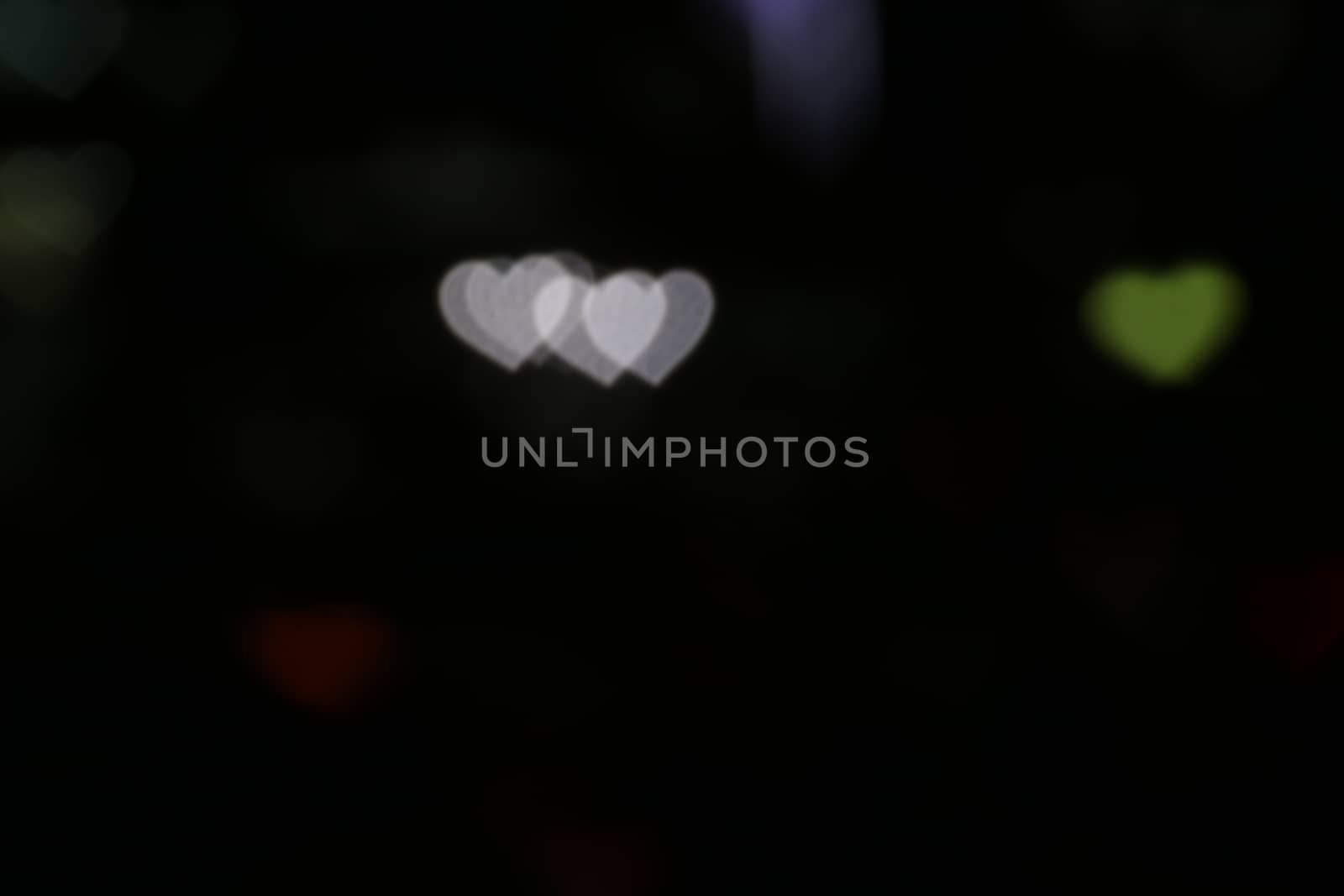 Valentines Colorful heart-shaped on black background lighting bokeh for decoration at night backdrop wallpaper blurred valentine, Love Pictures background, Lighting heart shaped soft at night abstract by cgdeaw