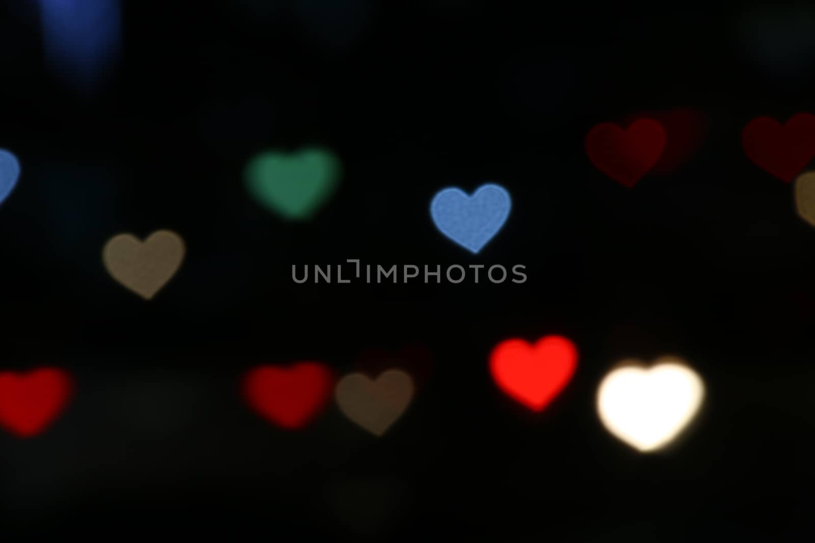 Valentines Colorful heart-shaped on black background lighting bokeh for decoration at night backdrop wallpaper blurred valentine, Love Pictures background, Lighting heart shaped soft at night abstract by cgdeaw