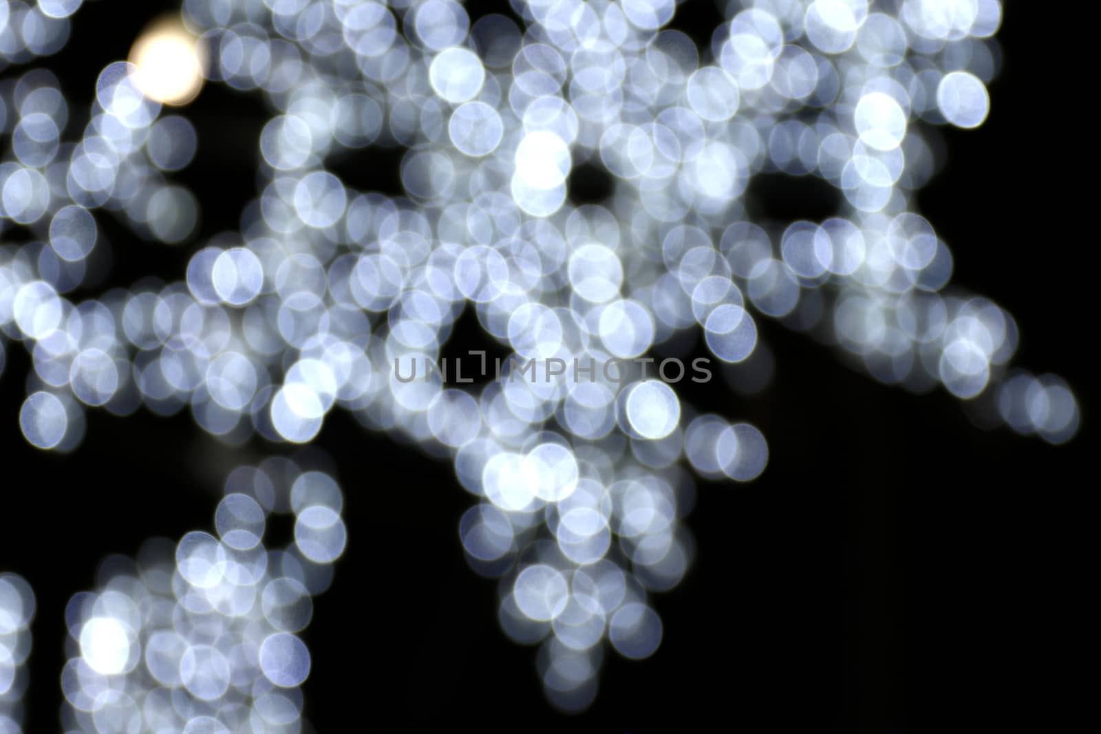 Blurred lighting defocused snow shaped background for decoration backdrop light glitter merry christmas and Happy new year