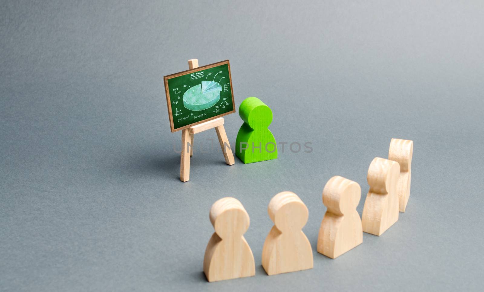 A person holds a presentation to a crowd of people at a briefing, development of the company. discussion of the business strategy. Analysis of the results, information market analysis. Selective focus