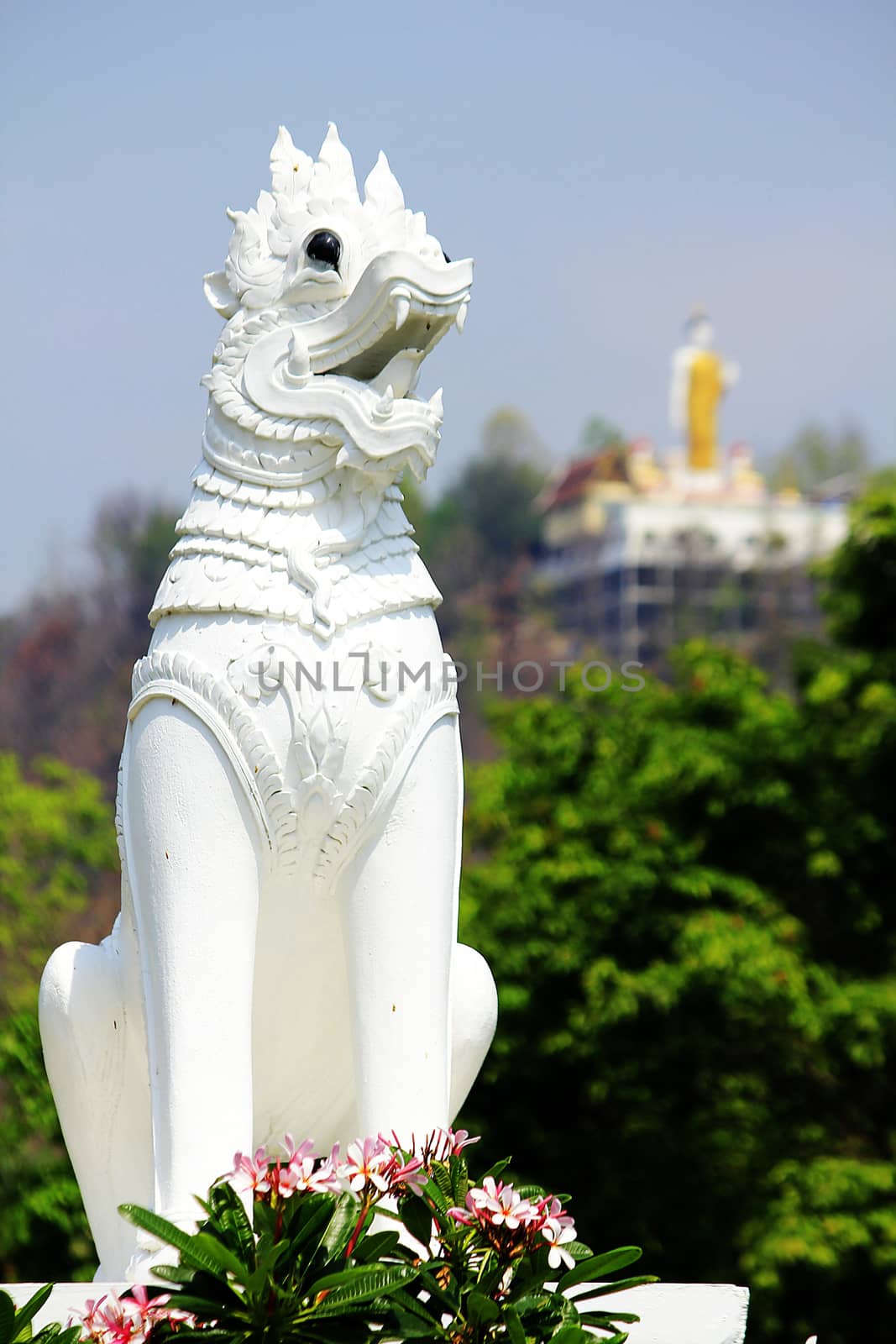 White Lion statue of Thailand decorated by temple