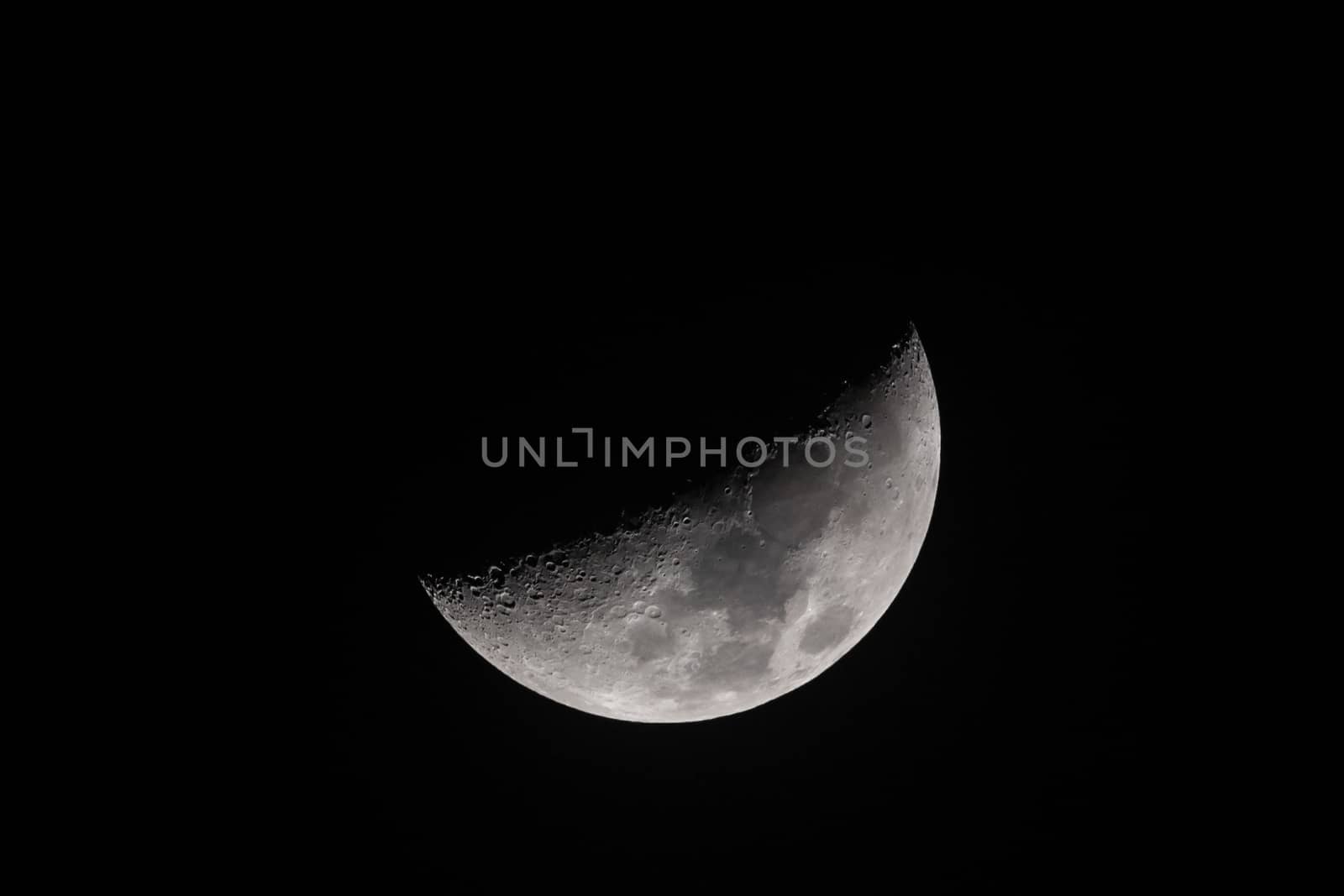 Moon first crescent close-up in dark night