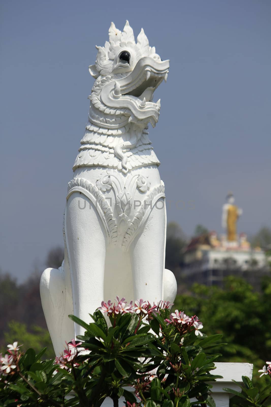 White Lion statue of Thailand decorated by temple