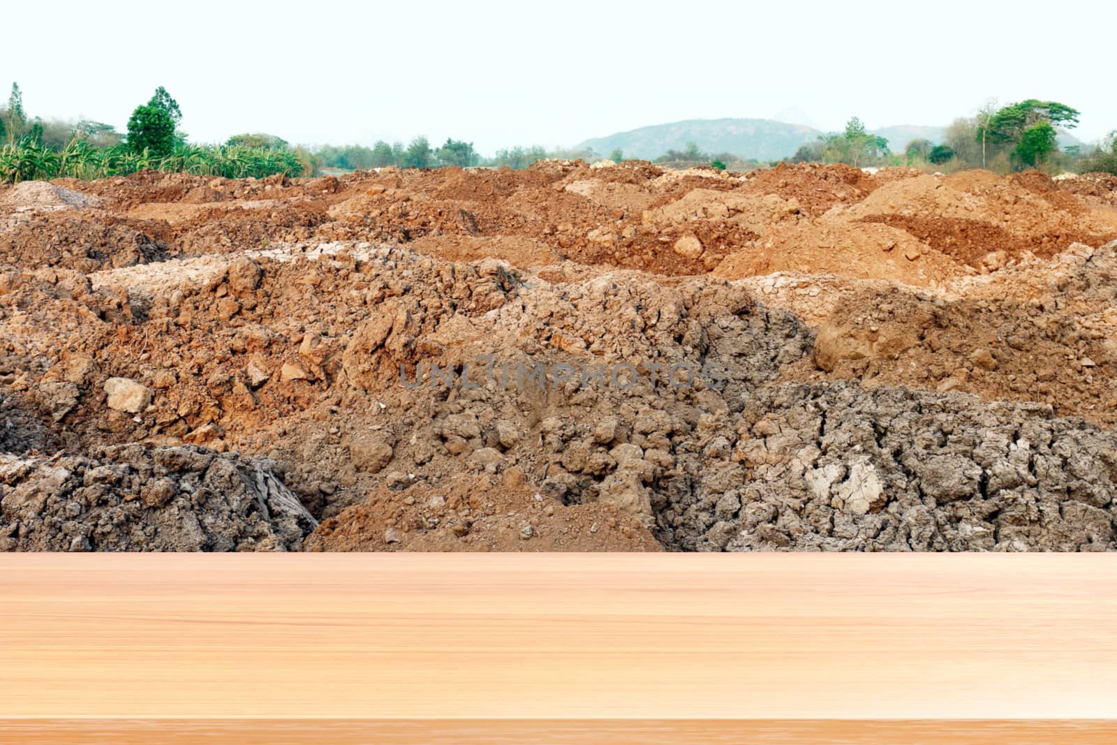 wood plank on soil pile many on ground for construction, empty wood table floors on soil for agriculture farming background, wood table board empty on soil background for mock up display products