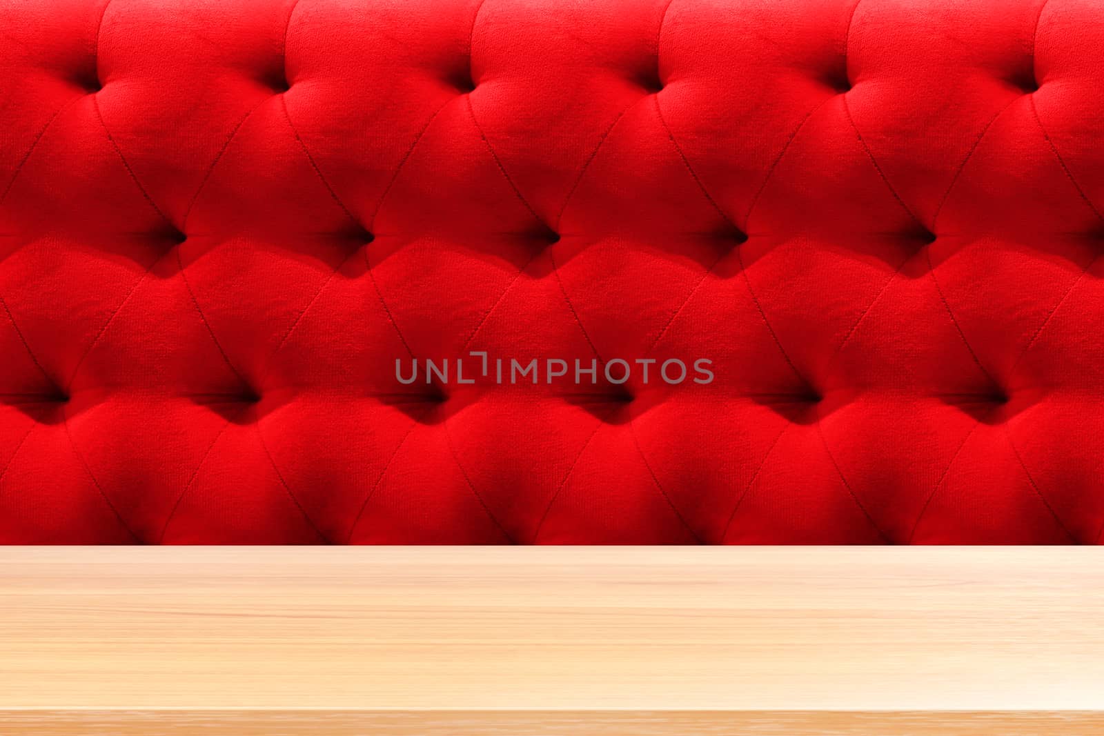 wood plank on luxury red sofa velvet cushion background, empty wood table floors on red sofa texture background, wood table board empty on red sofa for mock up display products