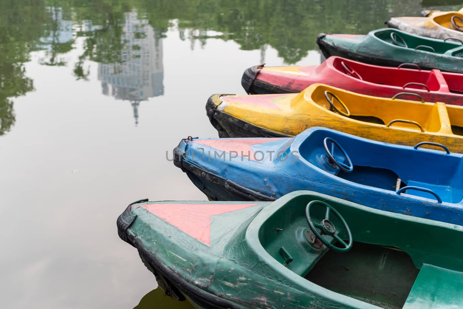 old multicolored boats on a lake, Chengdu, China