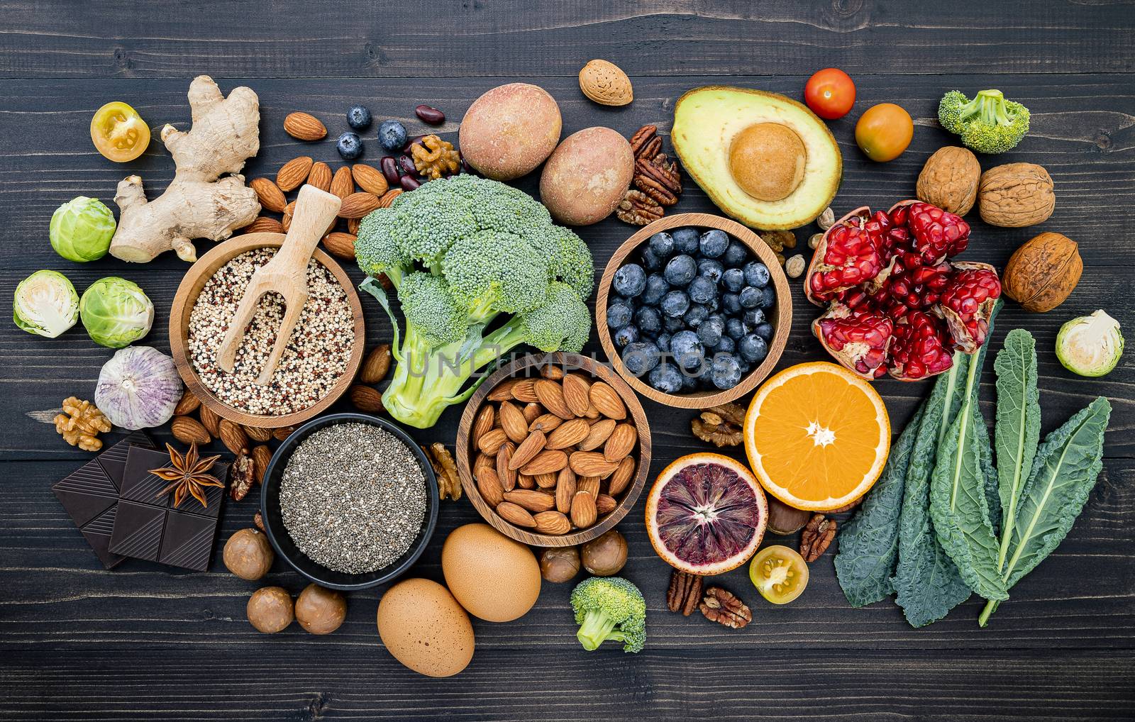 Ingredients for the healthy foods selection. The concept of healthy food set up on wooden background.